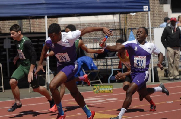 Kingston College team exchanges baton in their race