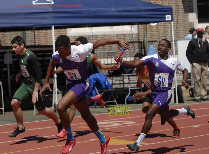 Kingston College team exchanges baton in their race