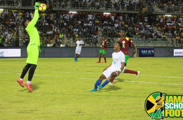 Ruseas vs Green Island action on opening day