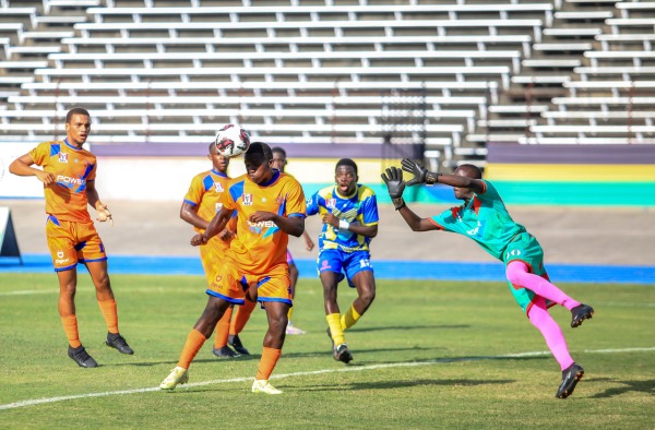 Game action between Clarendon College and Lennon High - McNamee Sports Media photo